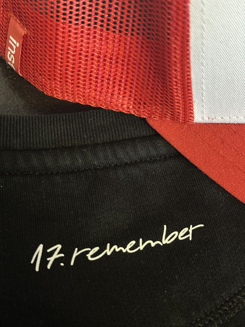 instarea team members at November 17th commemoration with instarea branding visible